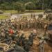 U.S. Marines with 4th Assault Amphibian Battalion, a unit based out of Tampa Bay, Florida, conduct a safety brief to Brazilian, Colombian, Peruvian, Chilean, Argentinian and Ecuadorian Marines before a ship-to-shore exercise during UNITAS LX on the Brazilian Marine Corps Base of Ilha do Governador