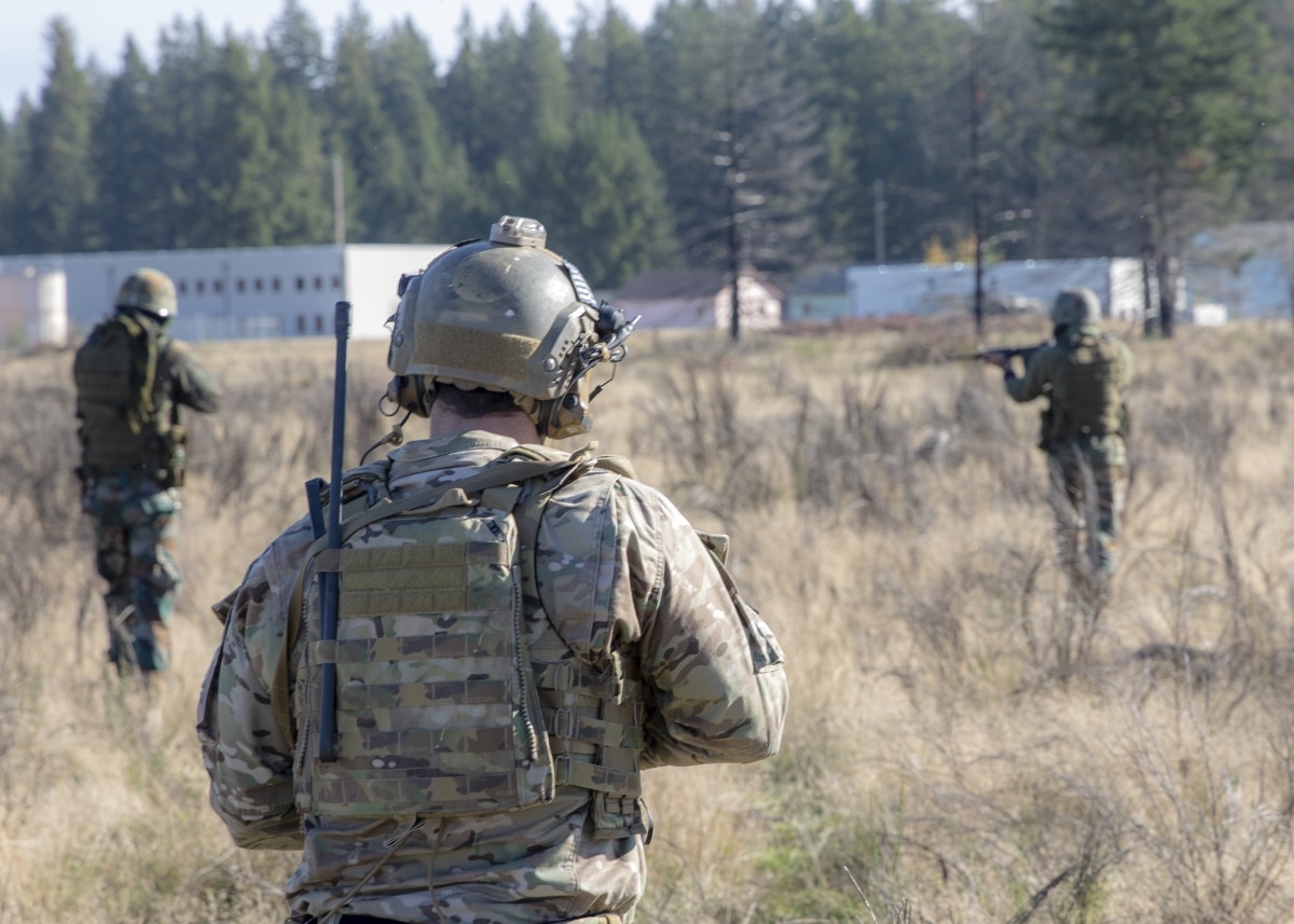 Joint Base Lewis-McCord, Wash. - Soldiers with the 1st Special Forces Group (Airborne) and the Indian Army’s 3rd Paramilitary Special Forces Battalion patrol a training compound