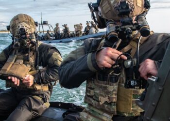 U.S. Navy SEALs prepare to launch a maritime boarding operation with the Lithuanian combat divers service, or KNT. The SEALs and the KNT worked together closely during Exercise Flaming Sword