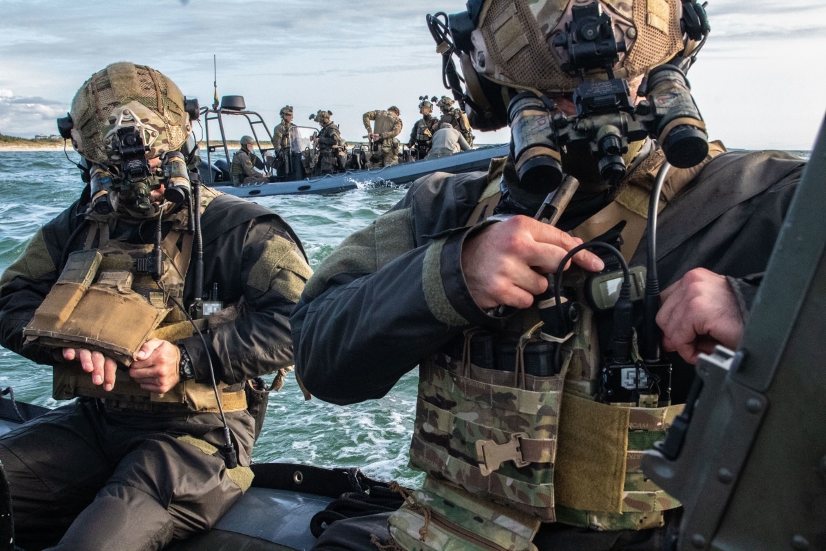 U.S. Navy SEALs prepare to launch a maritime boarding operation with the Lithuanian combat divers service, or KNT. The SEALs and the KNT worked together closely during Exercise Flaming Sword