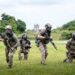 OKINAWA, Japan – Soldiers with 1st Battalion, 1st Special Forces Group (Airborne) and Explosive Ordinance Disposal Mobile Unit 5, begin a patrol towards an objective