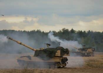 Soldiers with Alpha Battery, 1st Battalion, 5th Field Artillery Regiment (1-5), 1st Armored Brigade Combat Team (1ABCT), 1st Infantry Division (1ID) conduct Artillery Table XII with the M109 Paladin in Toruń