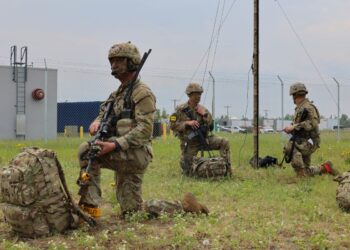 U.S. Army Paratroopers assigned to 3rd Battalion, 509th Parachute Infantry Regiment, 2nd Infantry Brigade Combat Team (Airborne), 11th Airborne Division, assemble at an airborne command post (ACP) to establish command and control of forces during RED FLAG-Alaska 22-2 on Allen Army Airfield, Fort Greely, Alaska, June 15, 2022.