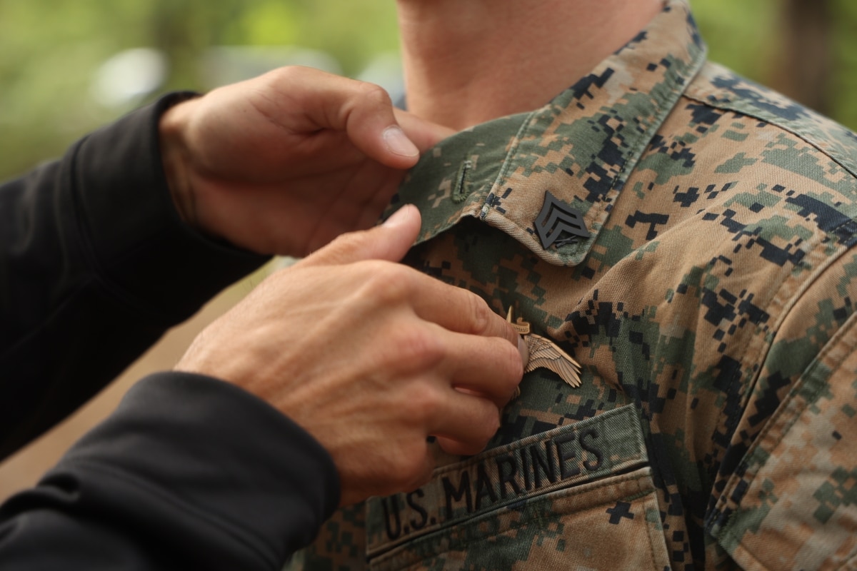 New critical skills operators and special operations officers receive their Marine Special Operations Insignia upon completing Individual Training Course during Raider Night at Camp Lejeune
