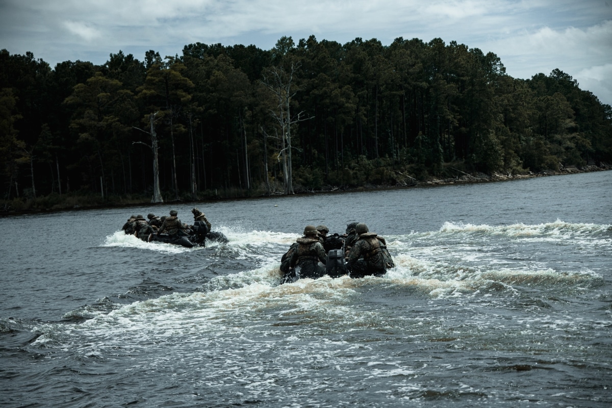 U.S. Marines with Headquarters and Service Company, 8th Engineer Support Battalion, Combat Logistics Regiment 27, ride a combat rubber reconnaissance craft during Summer Pioneer 2022 at Camp Lejeune, North Carolina