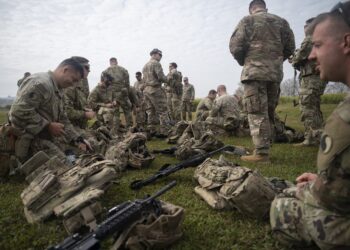 U.S. Army infantrymen assigned to the East African Response Force (EARF) load magazines in South Africa, July 21, 2022, for a range day in support of an expeditionary deployment readiness exercise.
