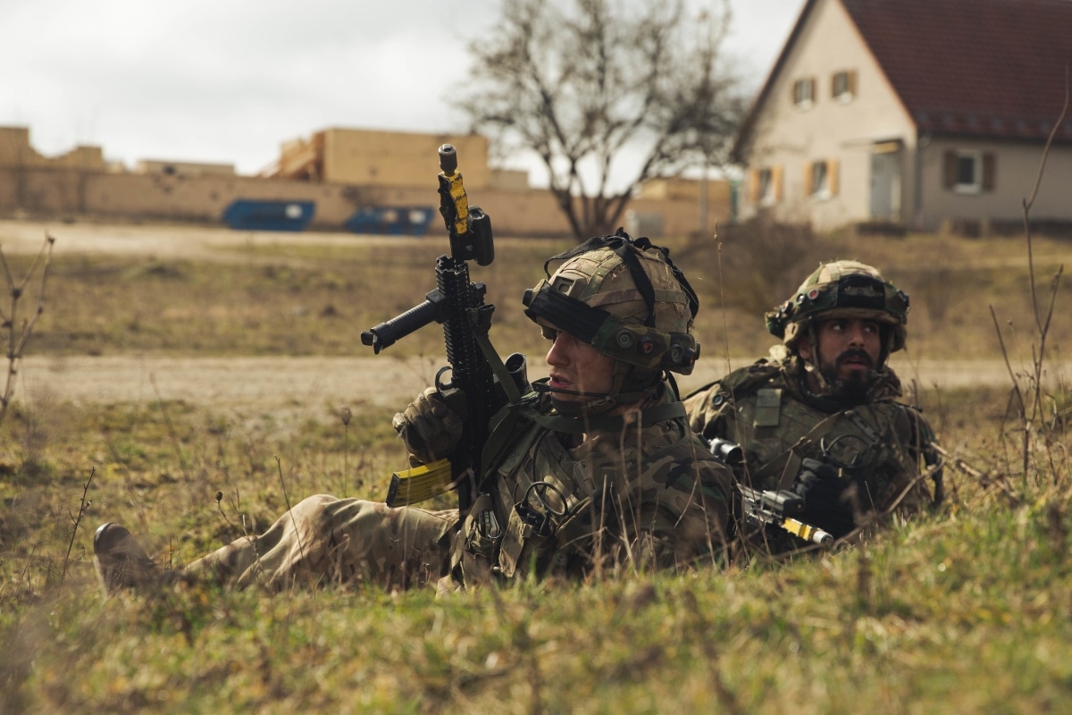 Cadets from the Royal Military Academy Sandhurst prepare to move cover during during Dynamic Victory 23-1 at the Joint Multinational Readiness Center near Hohenfels, Germany, on March 20, 2023.