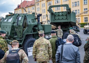 U.S. and NATO senior military leaders receive a tour of the M142 High Mobility Artillery Rocket System during the European Rocket Artillery Summit in Toruń, Poland, April 18, 2023.