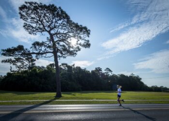 A runner strides to the finish during the 36th annual Gate-to-Gate Run May 27 at Eglin Air Force Base, Fla. The run is held to honor and remember those who made the ultimate sacrifice for the country. More than 800 people participated in the Eglin tradition. (U.S. Air Force photo/Samuel King Jr.)