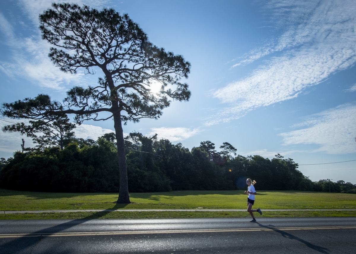 A runner strides to the finish during the 36th annual Gate-to-Gate Run May 27 at Eglin Air Force Base, Fla. The run is held to honor and remember those who made the ultimate sacrifice for the country. More than 800 people participated in the Eglin tradition. (U.S. Air Force photo/Samuel King Jr.)