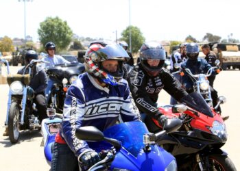 Staff Sgt. Michael S. Almendarez, the subsistence chief with field mess I Marine Expeditionary Force Headquarters Group, and the motorcycle club president, leads the way during a group ride at Camp Pendleton