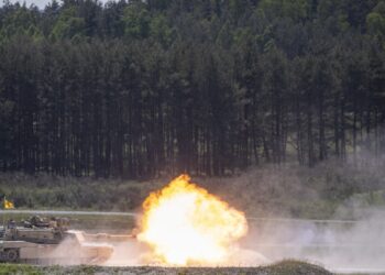 An M1A2 Abrams tank from 1st Battalion, 63rd Armor Regiment fires a round during training at Grafenwoehr, Germany, May 25, 2023.