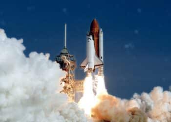 The launch of the space shuttle. With fire and smoke. Against the background of the starry sky. Elements of this image were furnished by NASA