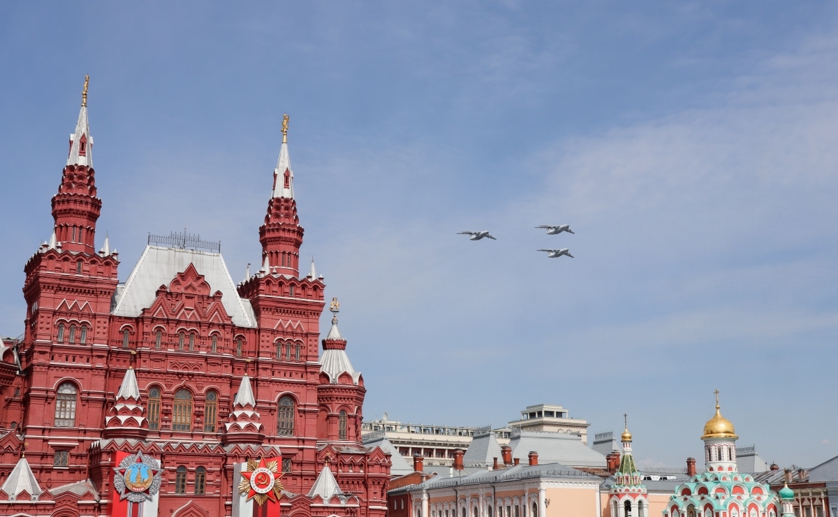 Moscow, Russia, May 2022: The flight in the sky of three IL-76MD heavy long-range military aircrafts in a blue sky. The main rehearsal of military parade on Red Square