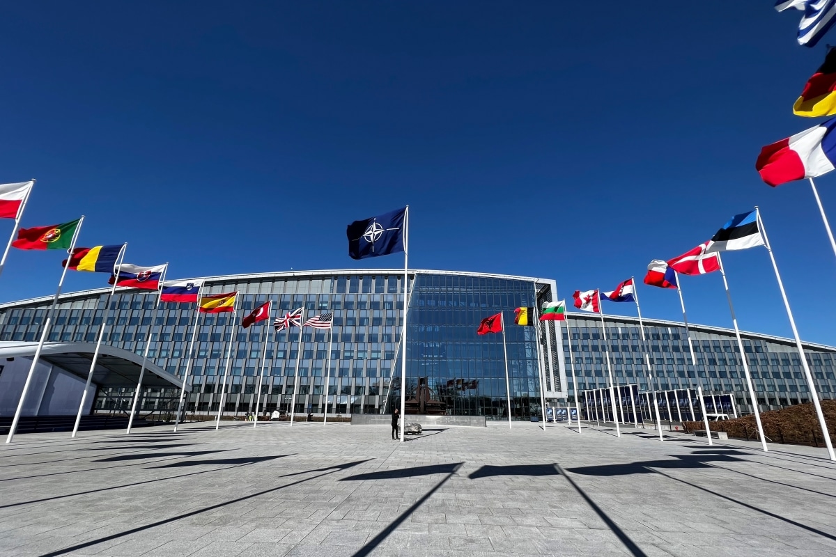 The national flags of countries member of the NATO fly outside the organisation headquarters in Brussels, Belgium on April 3, 2023.