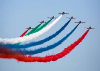 DUBAI, UAE - NOVEMBER 09: UAE Aerobatic Team Al Fursan (Fursan Al Emarat) performs the show with Aermacchi MB-339 aircraft at Dubai Airshow 2015 in Dubai on 09 November, 2015