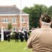 Livingston, NJ / United States - May 28 2018: A veteran pays his respect during a memorial service on Memorial Day.