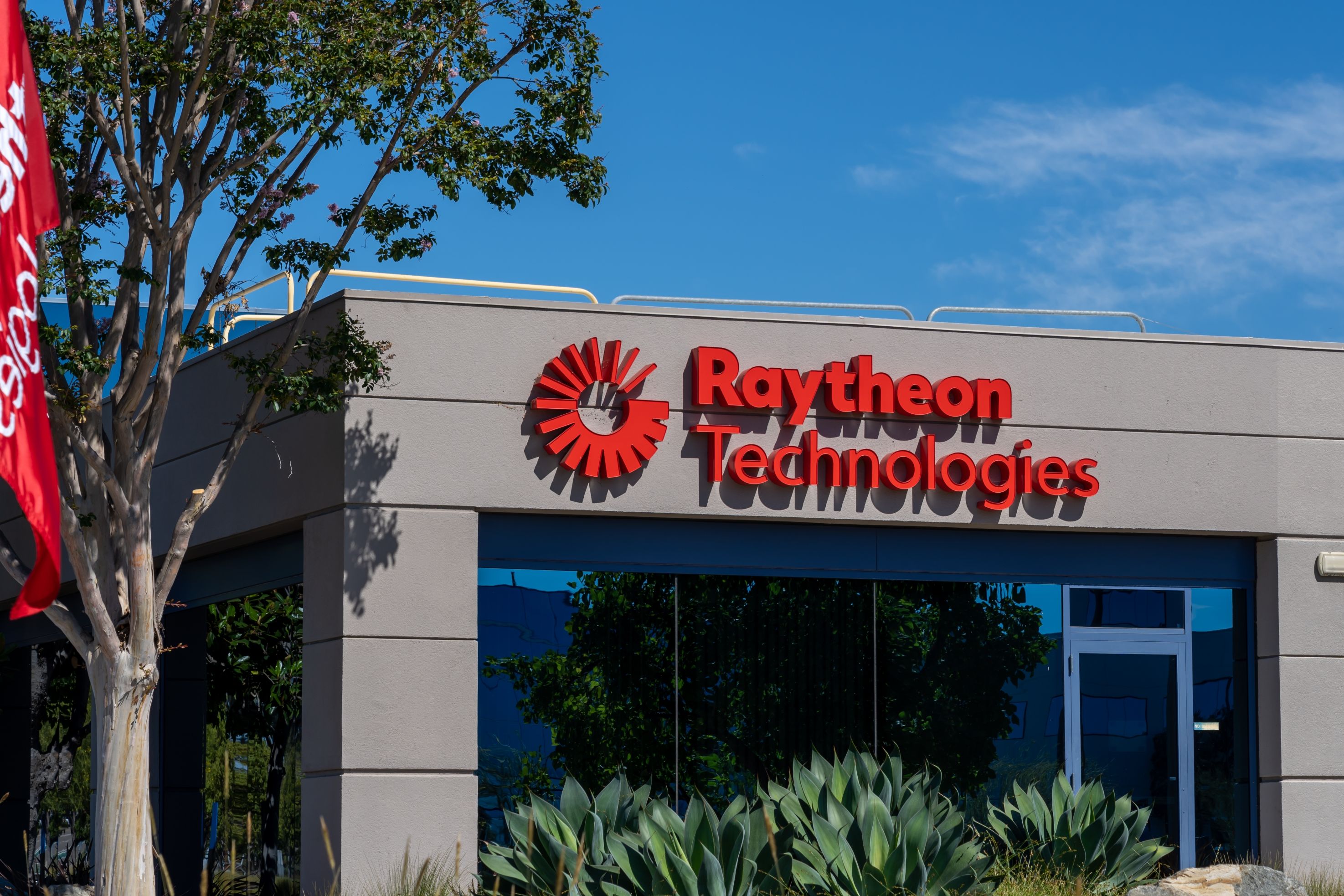 San Diego, CA, USA - July 9, 2022: Close up of Raytheon Technologies sign on the building. Raytheon Technologies Corporation is an American aerospace and defense conglomerate.