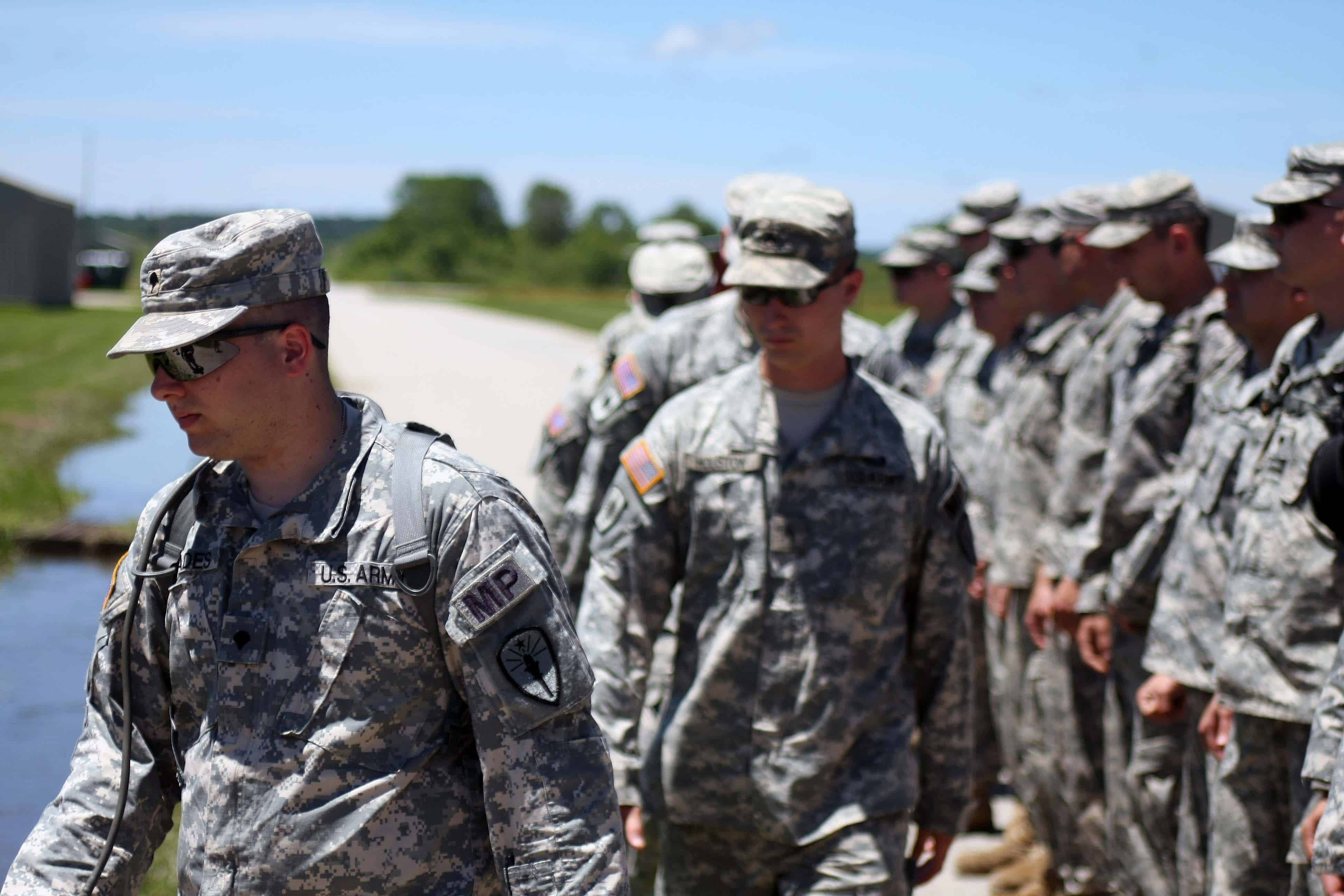 Soldiers from the Indiana Army National Guard, 81st Troop Command, begin to walk to the range in order to qualify with their M9 pistol June 19 at Camp Atterbury Joint Maneuver Training Center in central Indiana