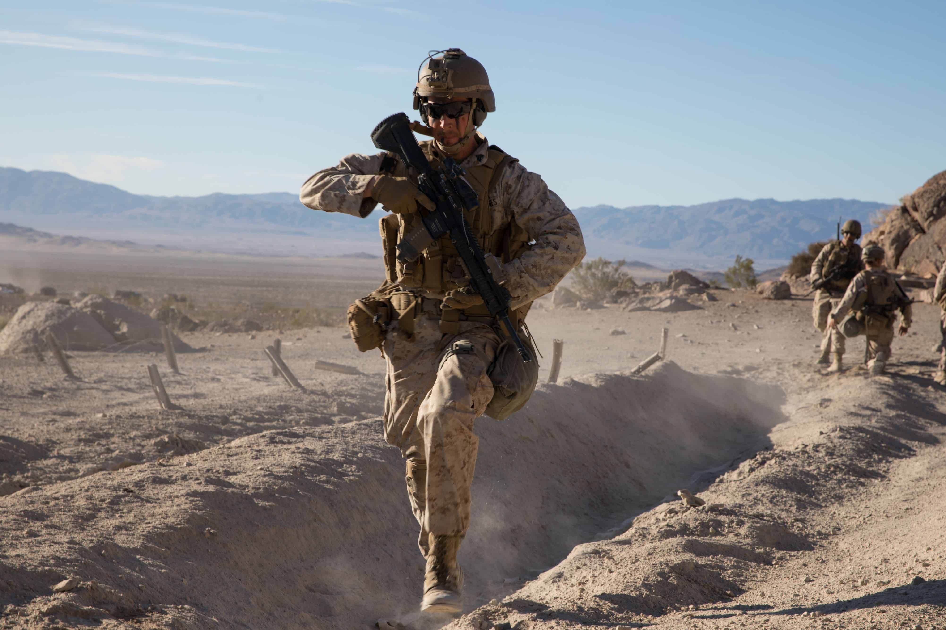 U.S. Marine Corps Sgt. Sean Nash, a rifleman with 2nd Battalion, 5th Marine Regiment, 1st Marine Division, provides cover fire during the Integrated Training Exercise (ITX) at Marine Air Ground Combat Center Twentynine Palms