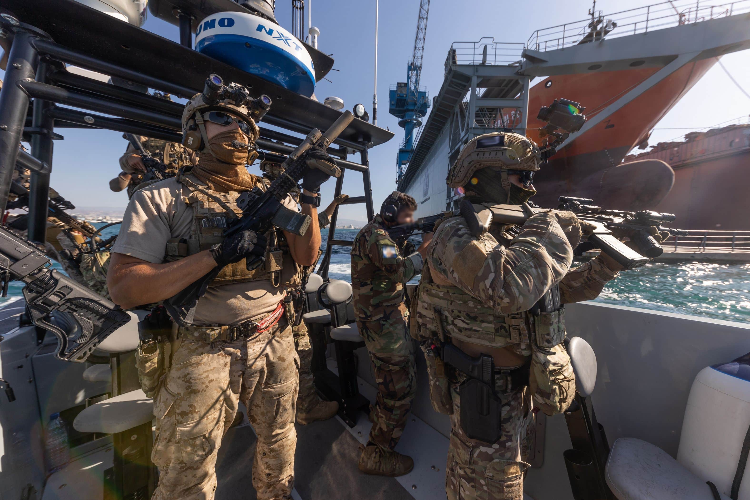 Cypriot Underwater Demolition Team (MYK) and members of US Naval Special Warfare Task Unit Europe (NSWTU-E) prepare to conduct maritime Visit, Board, Search and Seizure (VBSS) training in Cyprus
