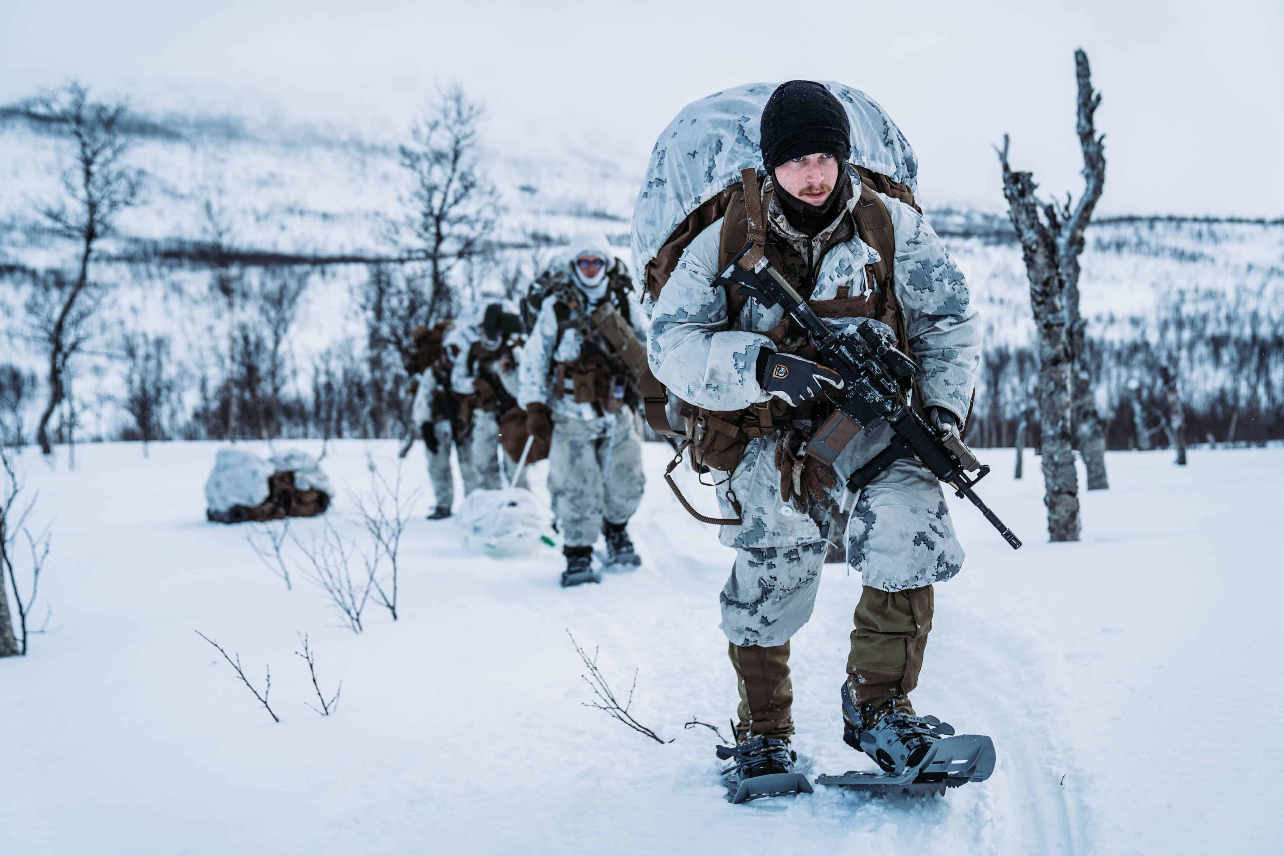 U.S. Marines with Jaeger (Hunter) concept platoon, 3rd Battalion, 6th Marine Regiment, 2nd Marine Division, hike to a hide site position prior to Exercise Cold Response 22 in Setermoen