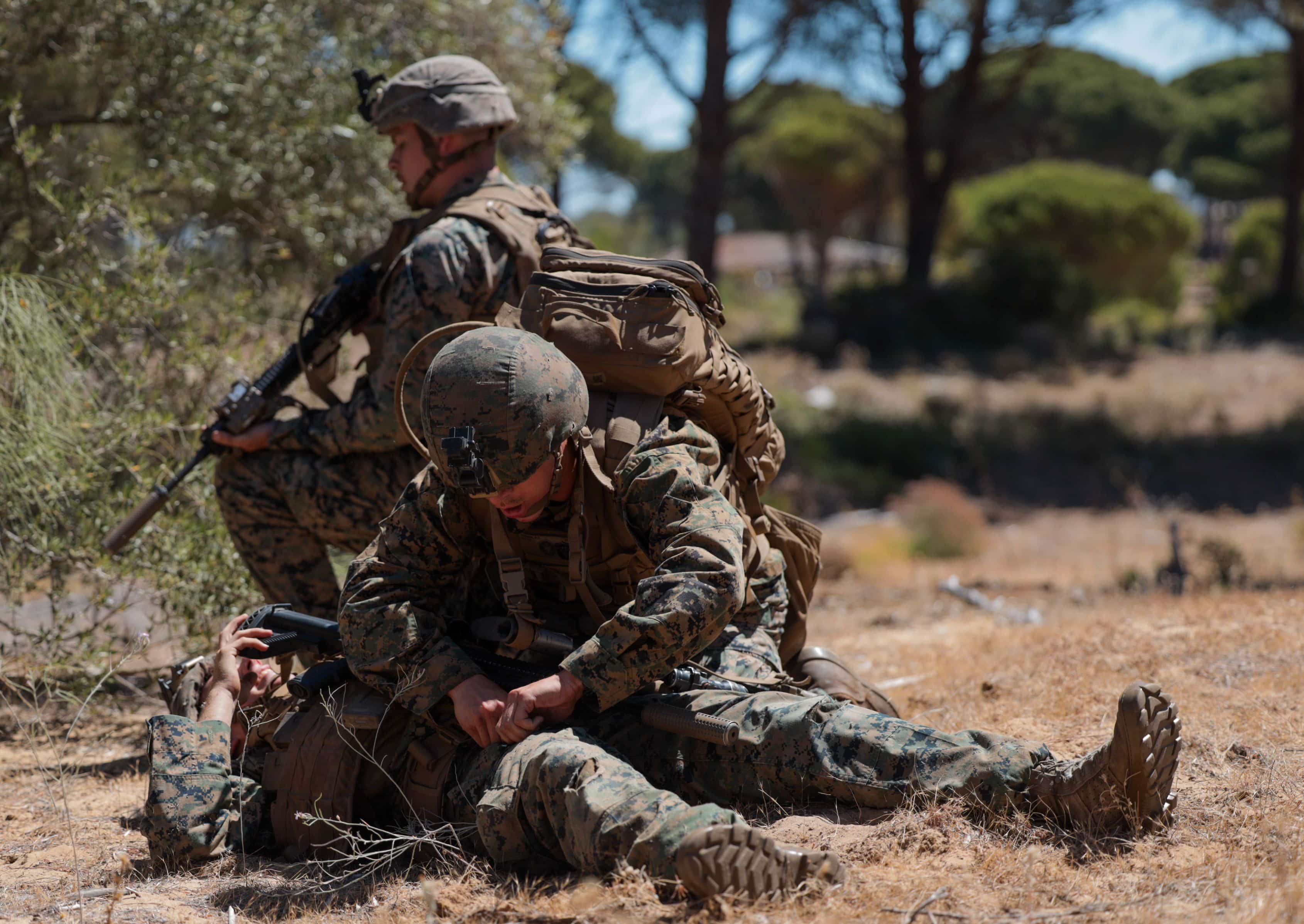 U.S. Navy Hospital Corpsman Dante Horner, a corpsman with 1st Battalion, 8th Marine Regiment, 2d Marine Division, performs tactical combat casualty care during Spanish FLOTEX-22 near Rota, Spain