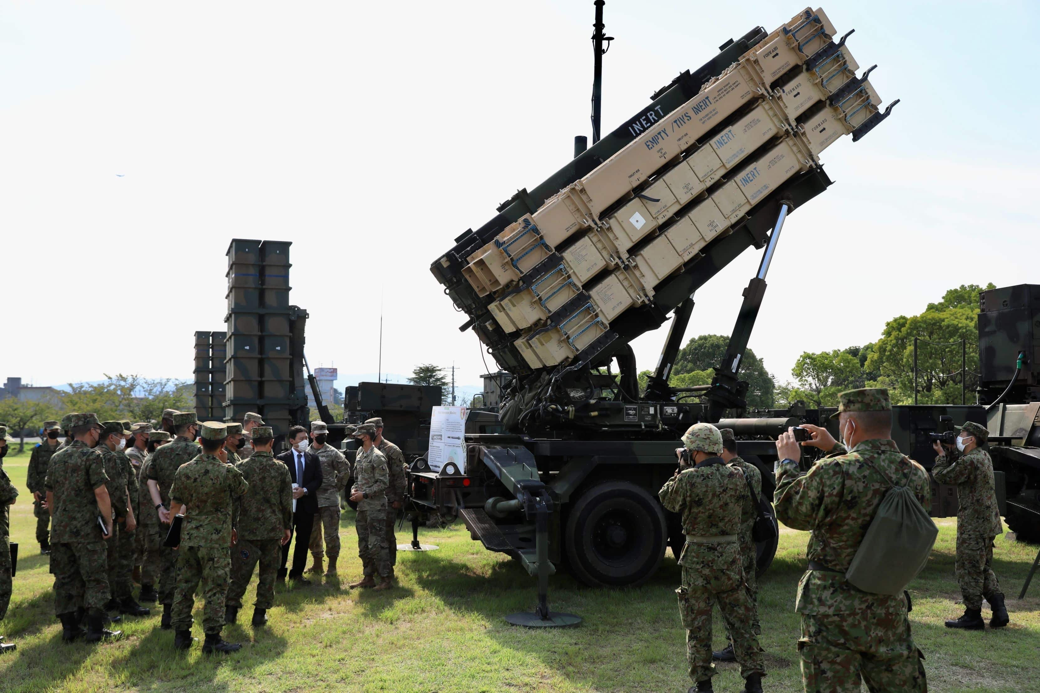Soldiers from Western Army, Japan Ground Self-Defense Force, receive a brief on the MIM-104 Patriot from Soldiers of the 38th Air Defense Artillery Brigade during Orient Shield 22 at Camp Fukuoka
