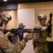 Operators from a U.S. Naval Special Warfare Unit shoot simulated targets while rehearsing close quarter combat scenarios alongside the Australian Army 2nd Commando Regiment at Holsworthy Barracks in New South Wales, Australia during Talisman Sabre