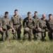 U.S. Marines with the 2nd Landing Support Battalion pose for a group photo during the airborne demonstration of Agile Spirit 2023 in Vaziani, Georgia, Aug. 23, 2023.