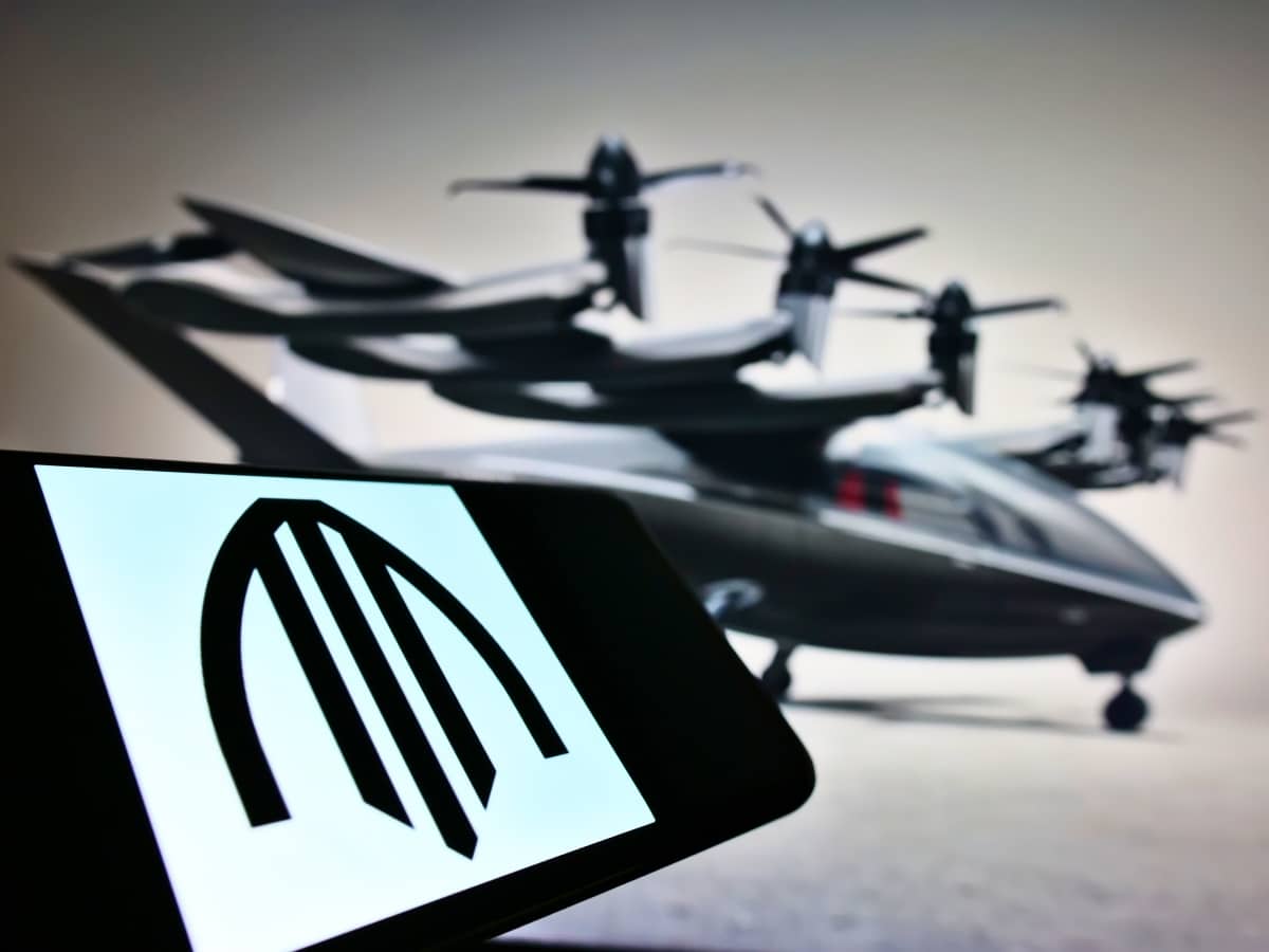 Stuttgart, Germany - 03-05-2021: Smartphone with business logo of US air taxi company Archer Aviation on screen in front of website. Focus on center of phone display. Unmodified photo.