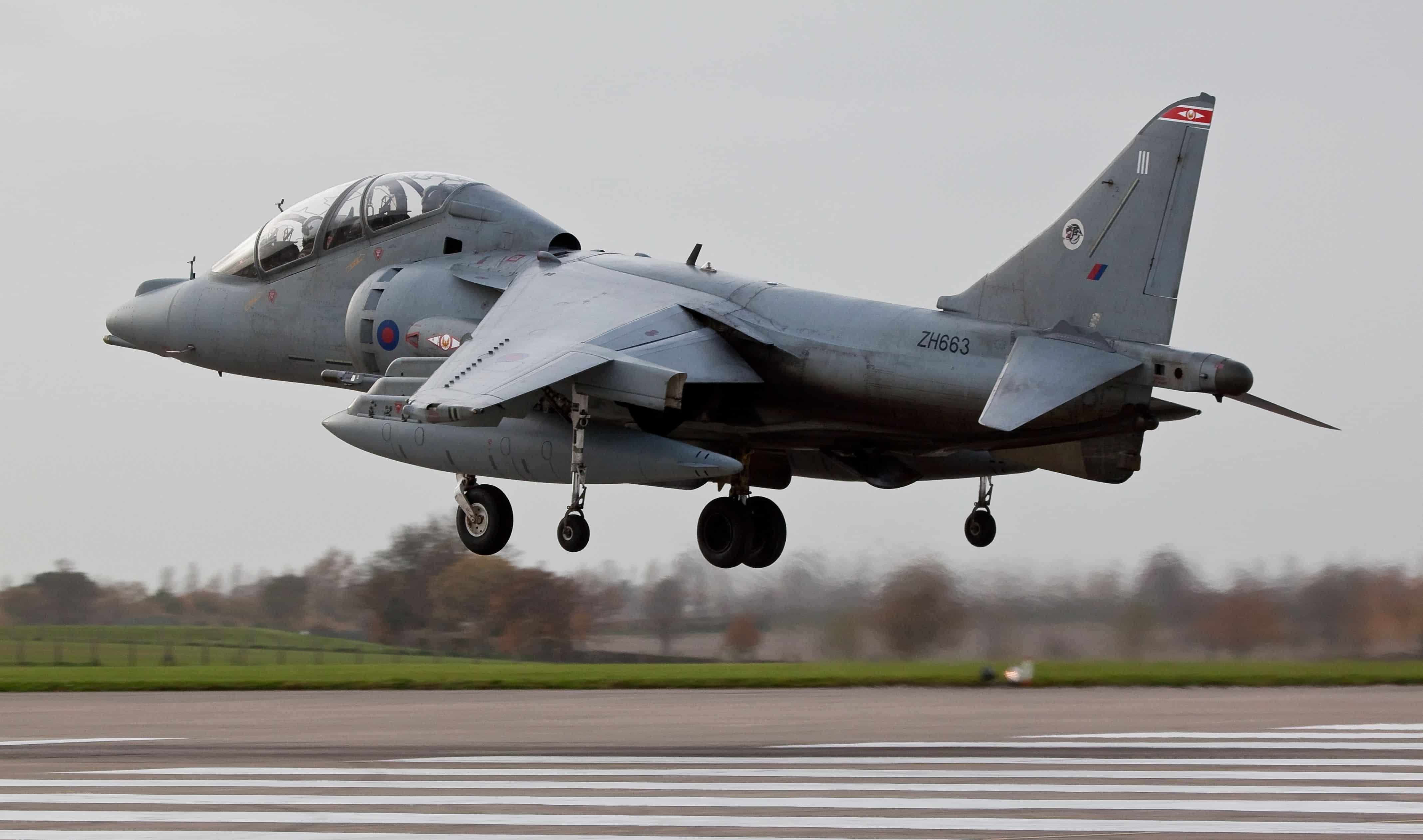 RAF COTTESMORE, RUTLAND, UK - NOVEMBER 2: BAe Systems Harrier T.12 ZH663 landing on November 2, 2010 at RAF Cottesmore, Rutland, UK.