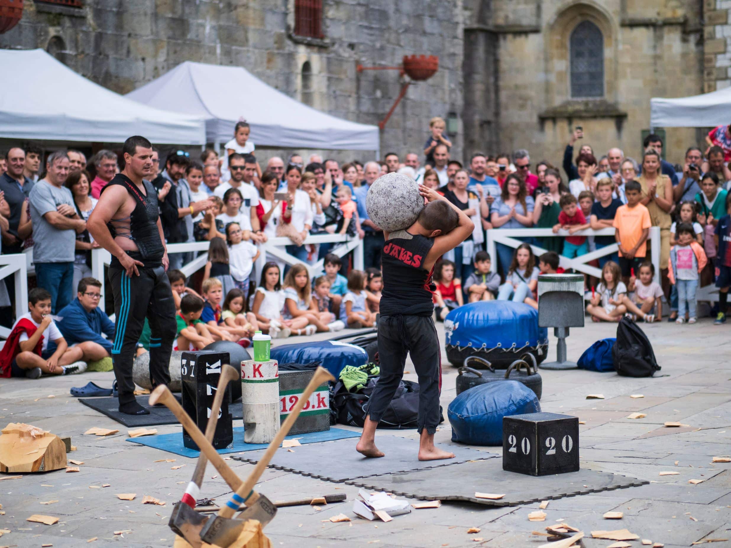 Hondarribia, Basque Country, Spain, August 5, 2019. Stone lifting (basque rural sport) display.