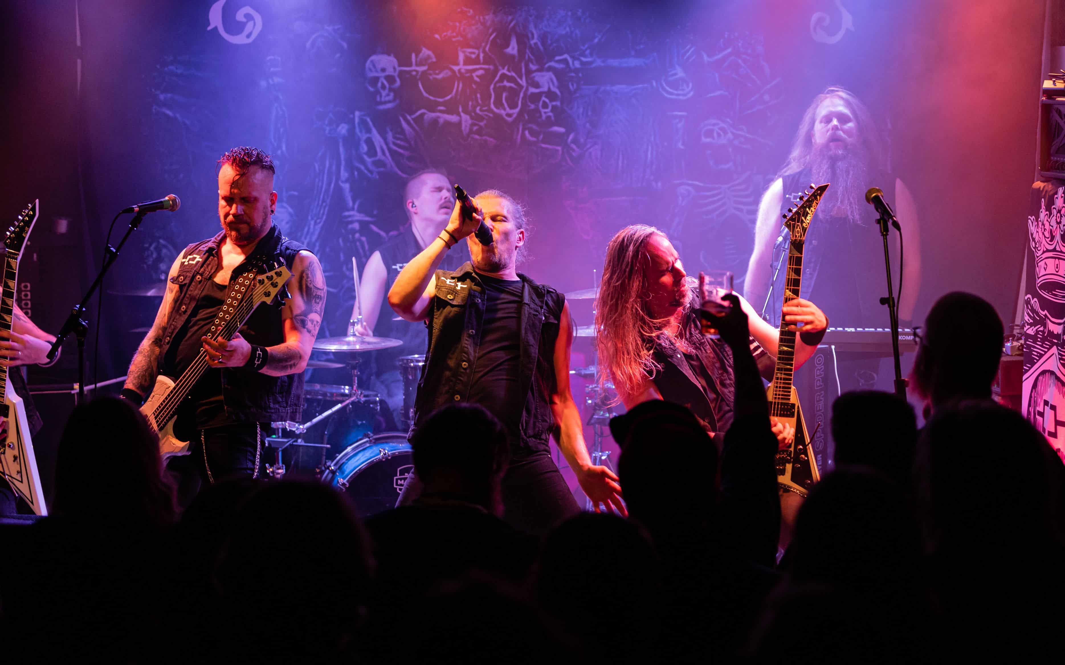 HAMEENLINNA, FINLAND – NOVEMBER 10 2021: Heavy metal band Omnium Gatherum performing at Suistoklubi. From left to right: Mikko Kivisto, Atte Pesonen, Jukka Pelkonen, Markus Vanhala, Aapo Koivisto