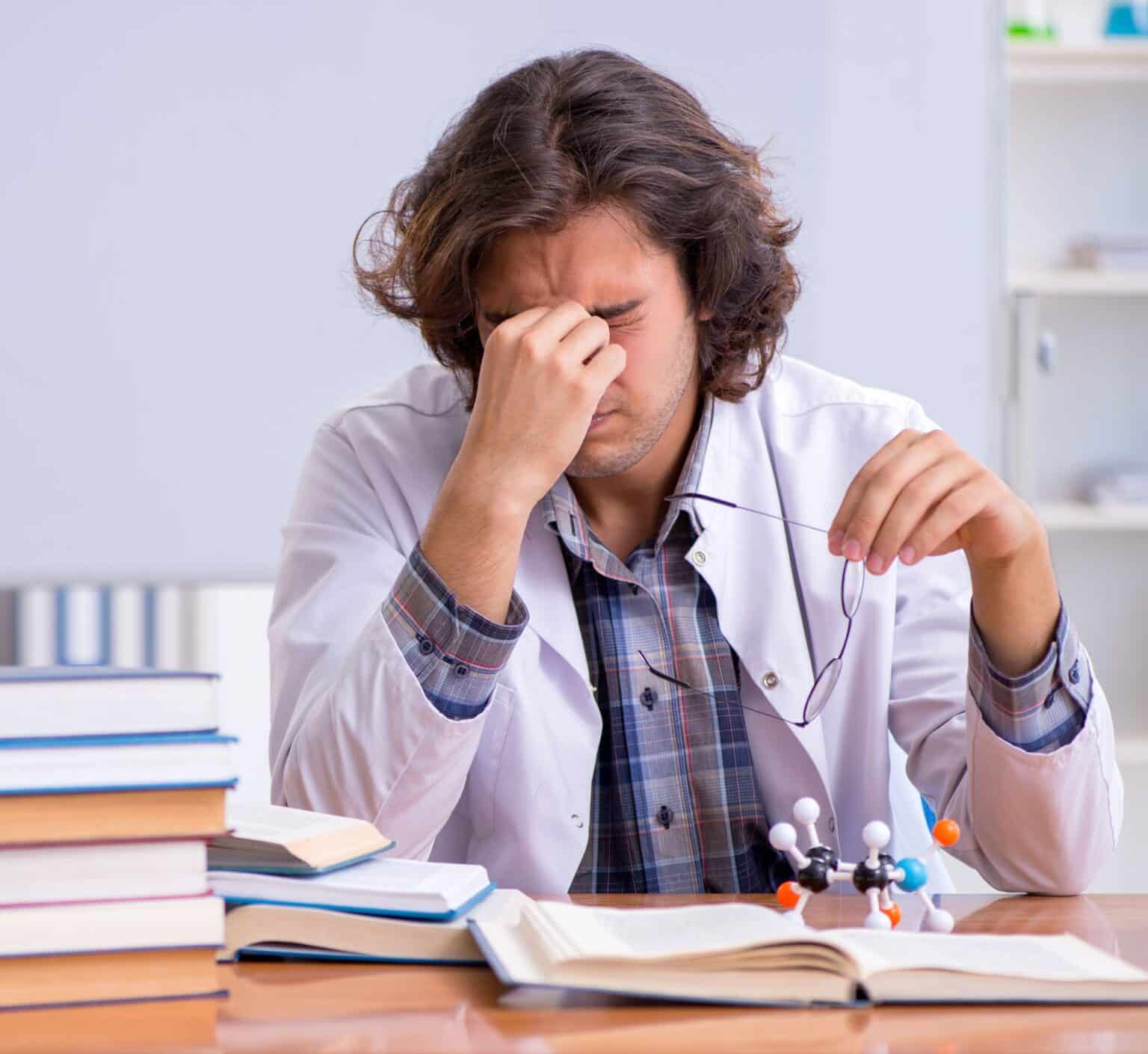 Chemistry lecturer during lecture in college