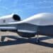 Jacksonville, Florida, USA - October 26, 2014: The U.S. Navy's MQ-4C Triton surveillance drone, also known as a UAV/UAS/unmanned aerial vehicle/BAMS, at a naval base in Jacksonville, Florida