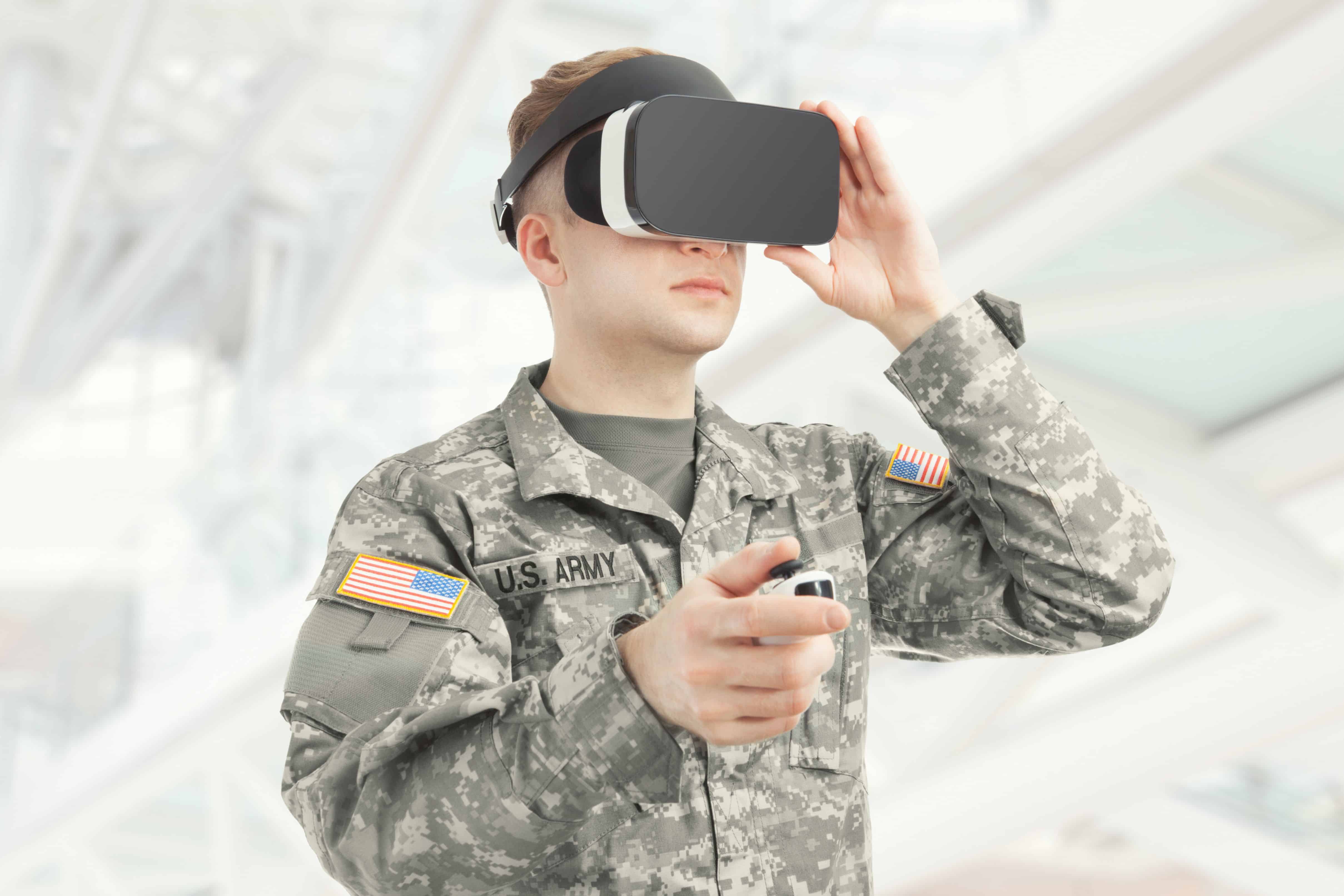 Indoors shot of American soldier wearing virtual reality glasses