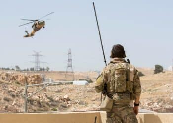 AMMAN, Jordan (May 11, 2017) An Air Force Combat Controller, part of the 23rd Special Tactics Squadron, watches as a Jordanian UH-60 helicopter makes an approach during Eager Lion 2017.