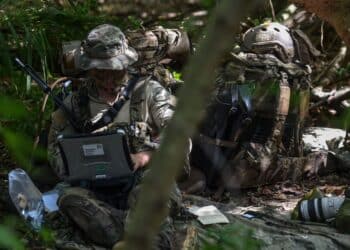 A Special Operations Weather Technician sends intelligence to the Reconnaissance Operations Center during the Marine's Reconnaissance Team Leader Course's final exercise, Oct. 31, 2017