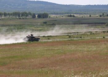 A Ukrainian T-84 tank moves down range on the Grafenwoehr Training Area's Range 117 to conduct the offensive operations lane during the 2018 Strong Europe Tank Challenge, June 4, 2018.