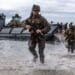 U.S. Marines conduct a simulated amphibious assault of exercise Talisman Sabre 19 in Bowen, Australia, July 22, 2019. Talisman Sabre provides an opportunity to conduct operations in a combined, joint and interagency environment that will increase participating countries' abilities to plan and execute contingency responses, from combat missions to humanitarian assistance efforts. (U.S. Marine Corps photo by Lance Cpl. Tanner D. Lambert)