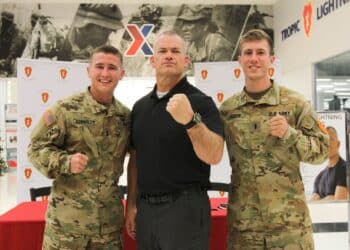 Retired U.S. Navy SEAL, John Gretton "Jocko" Willink, poses with fans on October 28, 2019 at Schofield Barracks, Hawaii. Willink's visit was one of many events during 25th Infantry Division's 2019 Tropic Lightning Week. (U.S. Army photo by Sgt. Effie Mahugh)