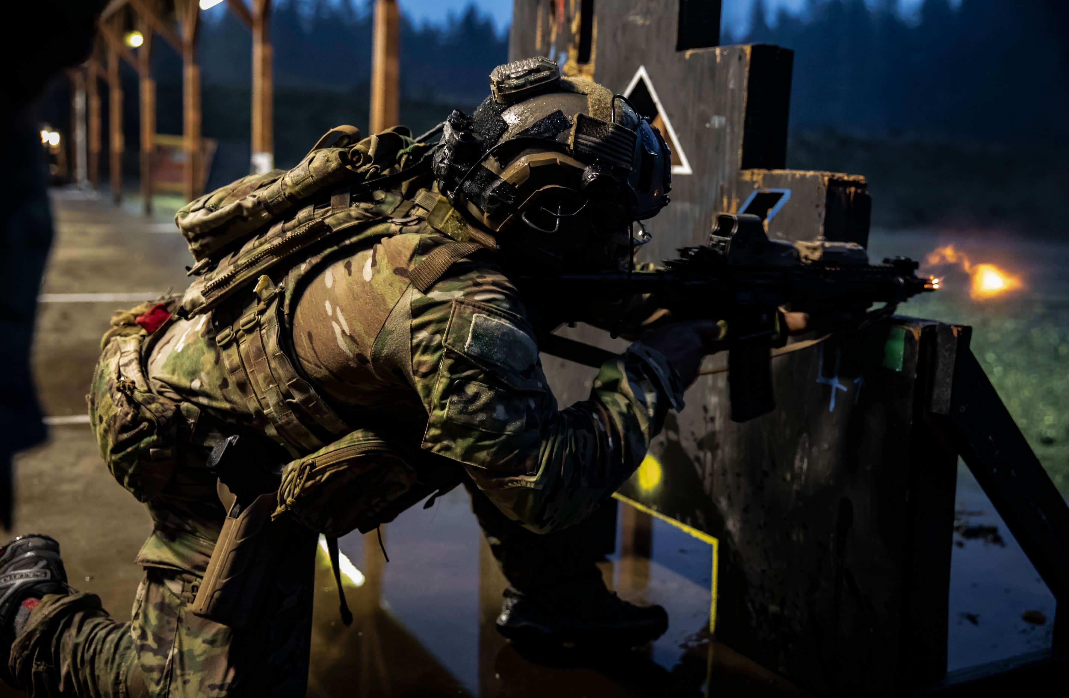 JOINT BASE LEWIS-MCCHORD, Wash. – A Green Beret with 1st Special Forces Group (Airborne) fires his weapon during the stress shoot phase of the Menton Week team competition at Joint Base Lewis-McChord, Wash