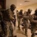 210113-N-YD651-1054 5TH FLEET AREA OF OPERATIONS (Jan. 13, 2021) Bahrain Defense Force and U.S. Naval Forces Central Command personnel simulate clearing a building during a joint anti-terrorism exercise in the U.S. 5th Fleet Area of Operations, Jan. 13. The bilateral exercise focused on enhancing mutual security and anti-terrorism capabilities by testing responses to simulated scenarios. (U.S. Navy photo by Mass Communication Specialist 2nd Class Matthew Riggs)