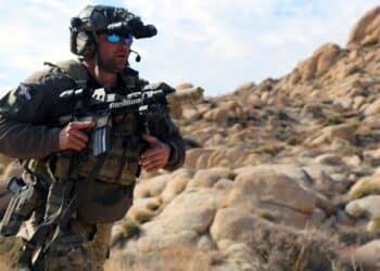 FORT IRWIN, Calif.- A U.S. Army Green Beret with 1st Special Forces Group (Airborne) maneuvers to counter an enemy attack during a notional ambush at the National Training Center, Fort Irwin, Calif., on March 17, 2021. The training exercises focused on the Green Berets