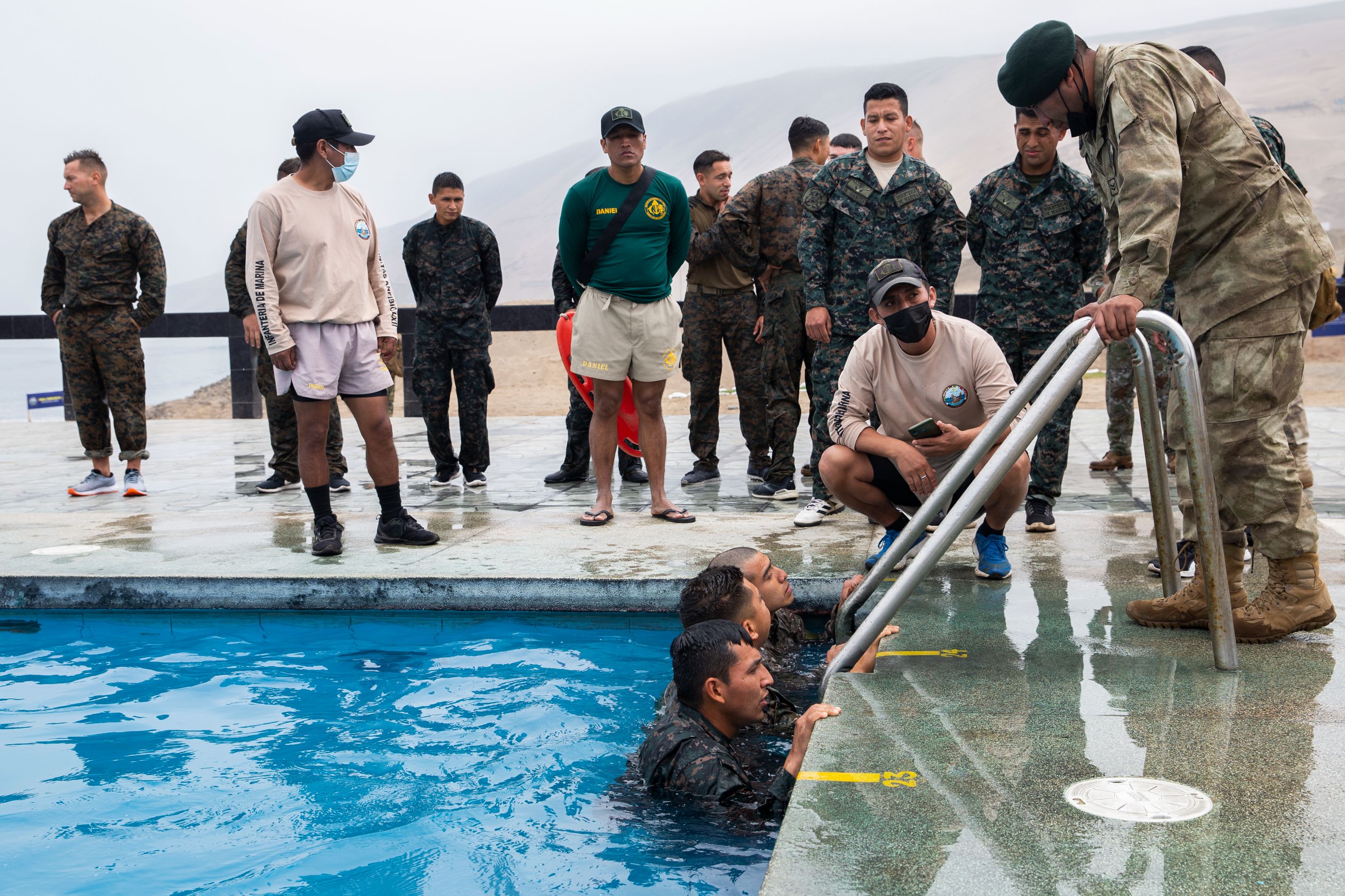 U.S., Brazilian, Chilean, Colombian, Mexican, and Peruvian Marines and members of the Jamaican Defense Force, conduct a basic swim qualification before an amphibious training evolution at Peruvian Marine Corps Base Ancon, Peru, Sept. 27, 2021, during exercise UNITAS LXII.