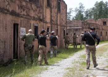 U.S. Army 3rd Special Forces (Airborne) Soldiers practice clearing procedures as a team on a simulated town during Southern Strike at Camp Shelby, Mississippi, April 16, 2023. Southern Strike is an exercise that allows Special Forces Units to train partner forces and better their craft on mission essential tasks at Camp Shelby. (U.S. Army photo by Sgt. Ashlind House)