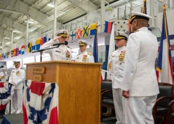 Capt. Kertreck Brooks is relieved by Capt. Kenneth Froberg as commanding officer of U.S. Navy Recruit Training Command during a change of command ceremony at Midway Ceremonial Drill Hall, Great Lakes, Illinois, July 18, 2023. More than 40,000 recruits train annually at the Navy’s only boot camp. (U.S. Navy photo by Mass Communication Specialist 1st Class Stephane Belcher)
