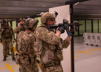 Operators from a U.S. Naval Special Warfare Unit shoot simulated targets while conducting close quarter combat training with the Australian Army 2nd Commando Regiment at Holsworthy Barracks in New South Wales, Australia during Talisman Sabre, July 20, 2023.