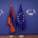 European union flag and flag of Armenia in European Council Building in Brussels, Belgium on Feb. 27, 2017